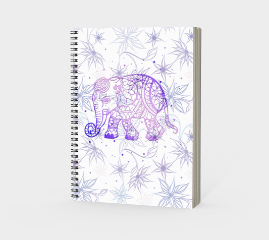 A spiral-bound notebook with a frosted polymer cover featuring a purple and white elephant design and floral patterns.